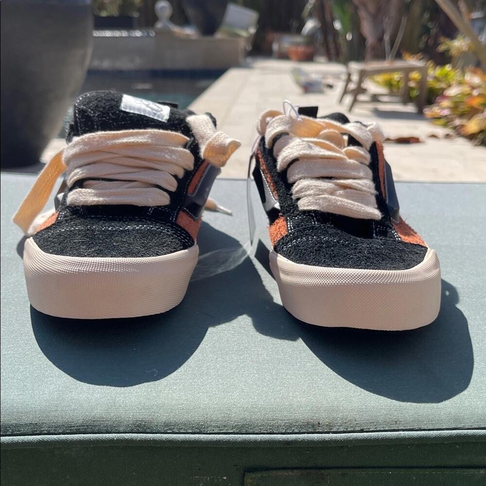 Vans Disney 100 Lion King Scar Knu Skool Black and Orange Sneakers